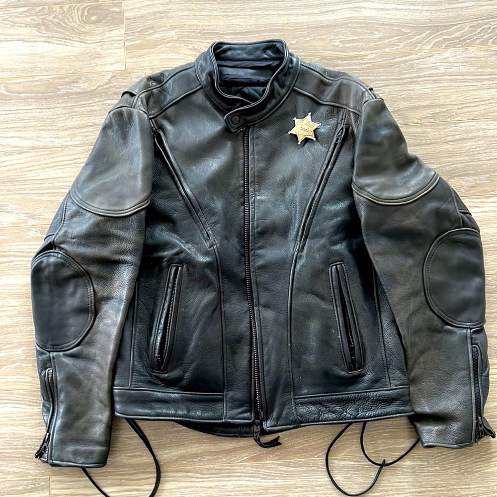 Leather Motorcycle Jacket. Super-thick leather. Top front zippered vents.